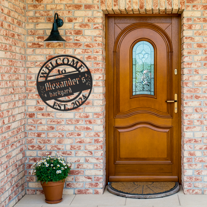 Alexanders_BackYard_BBQ_Metal_Sign_Black_Brick_Entrance_Mockup.png